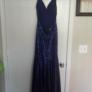 Backless dress from Windsor. Perfect for the holiday season